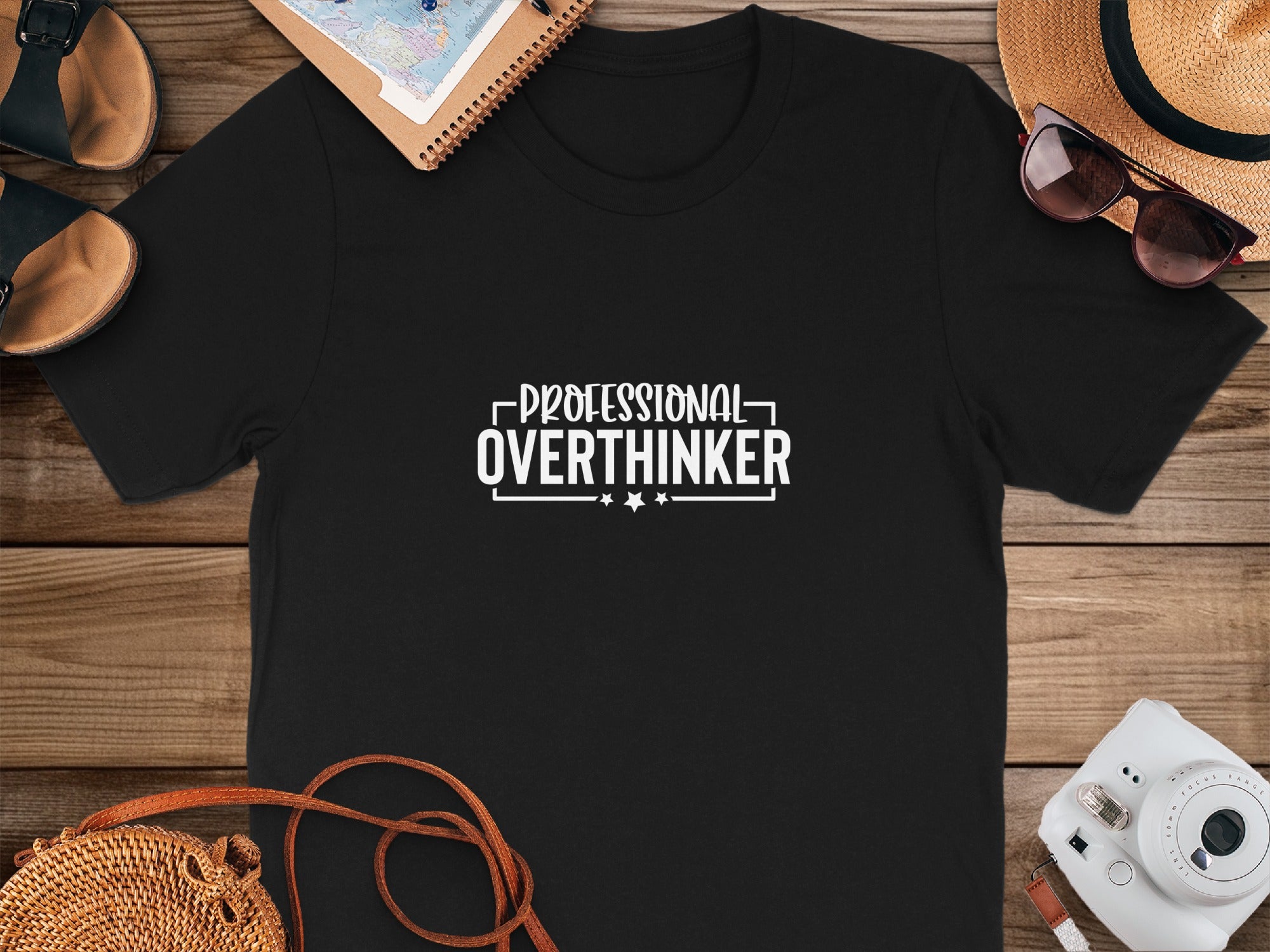 Black t-shirt with white text that reads "PROFESSIONAL OVERTHINKER".