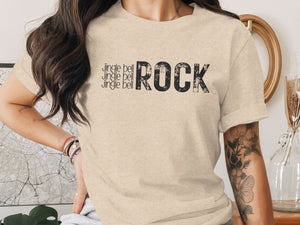 T-shirt with "Jingle bell" repeated three times and "ROCK" in distressed print.
