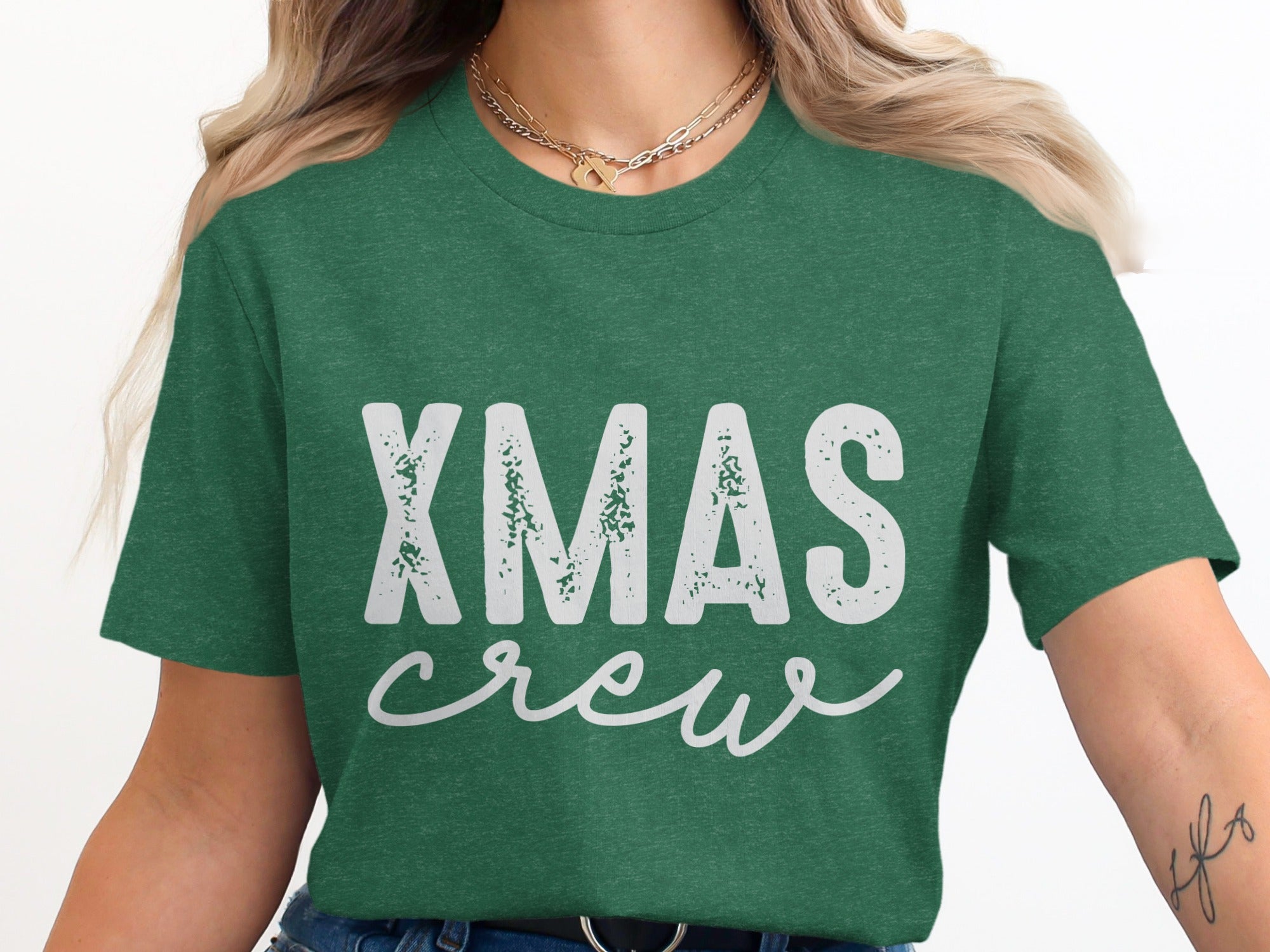 Green t-shirt with "XMAS crew" text in white distressed lettering