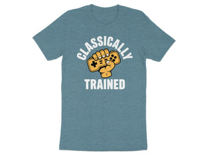 T-shirt with text "CLASSICALLY TRAINED" and a fist holding a game controller.