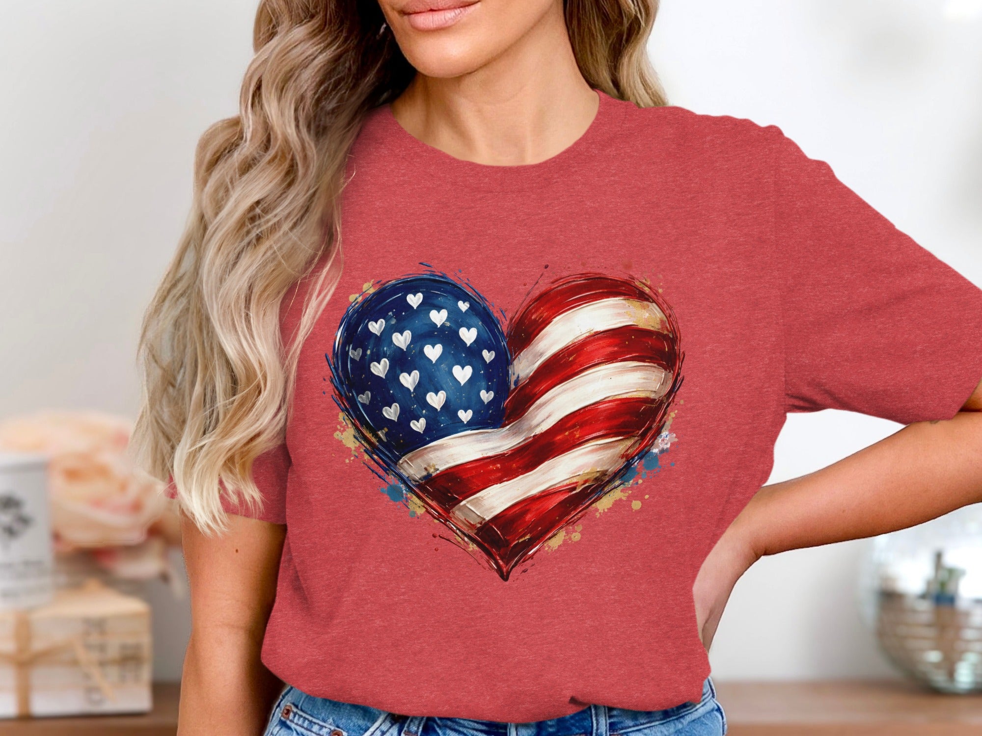 Red t-shirt with a heart graphic featuring the American flag design.