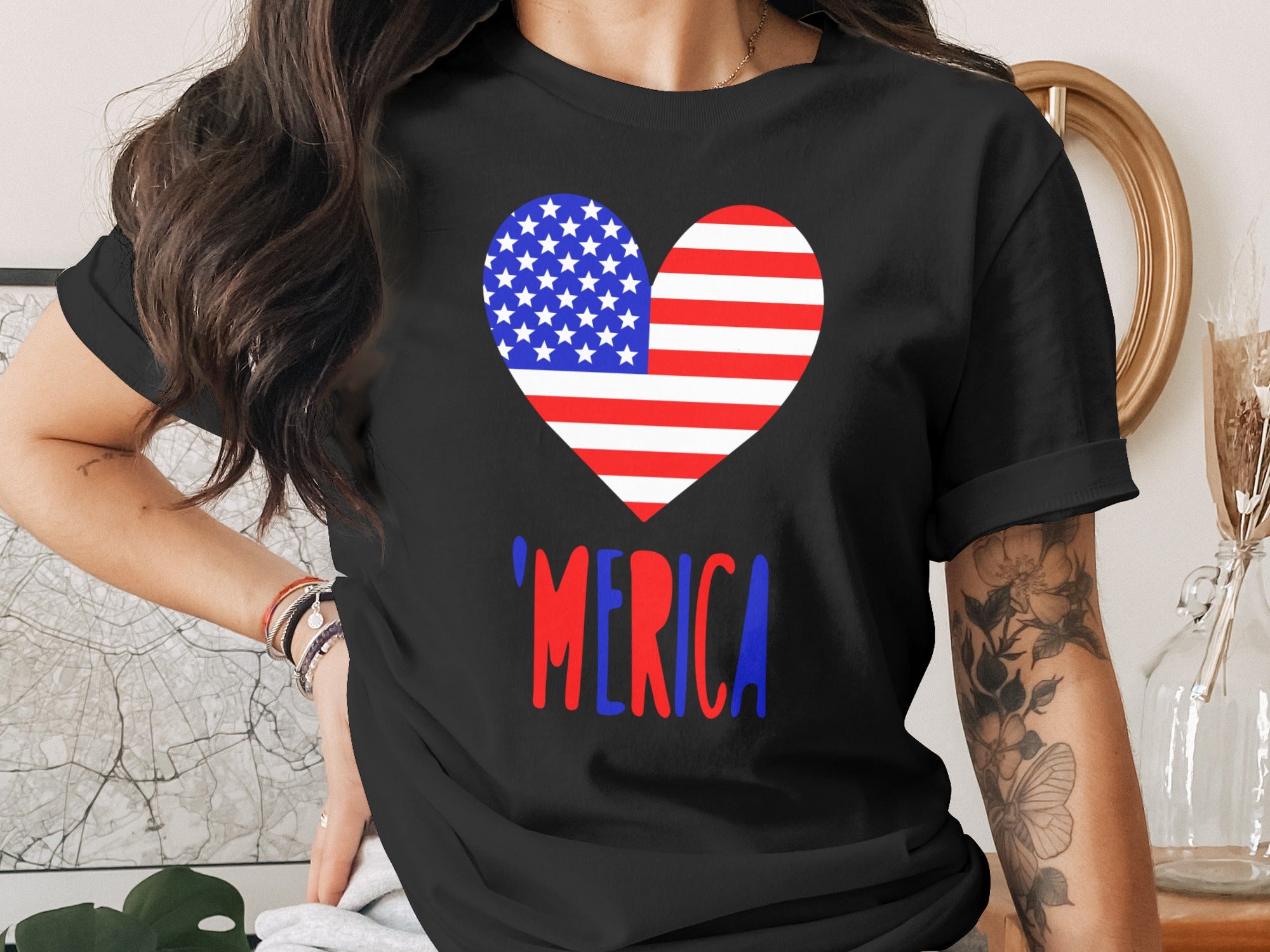 Black t-shirt with American flag heart and "'Merica" text.
