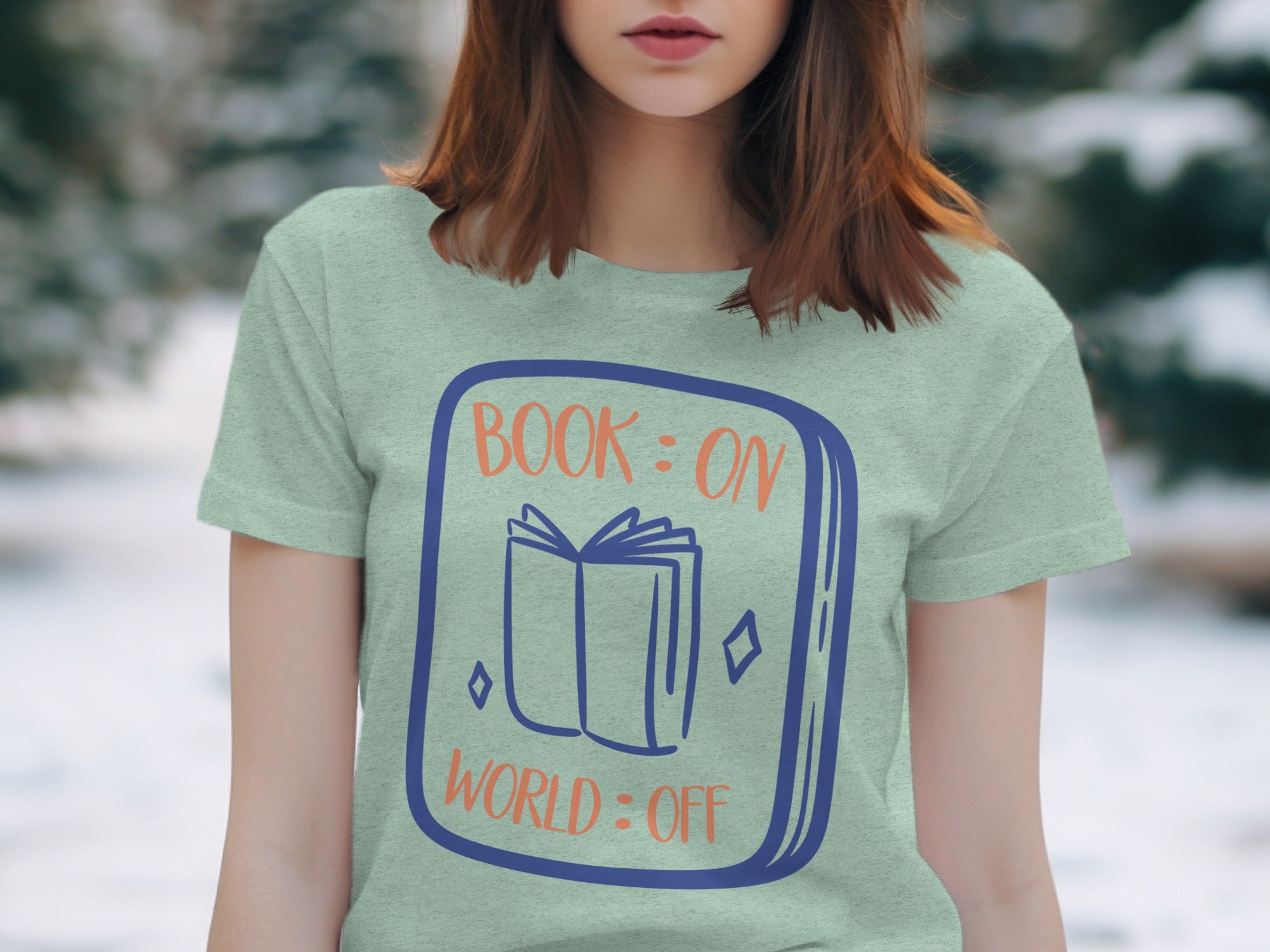 T-shirt with blue-outlined square featuring an open book and text "BOOK : ON WORLD : OFF".