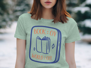 T-shirt with blue-outlined square featuring an open book and text "BOOK : ON WORLD : OFF".