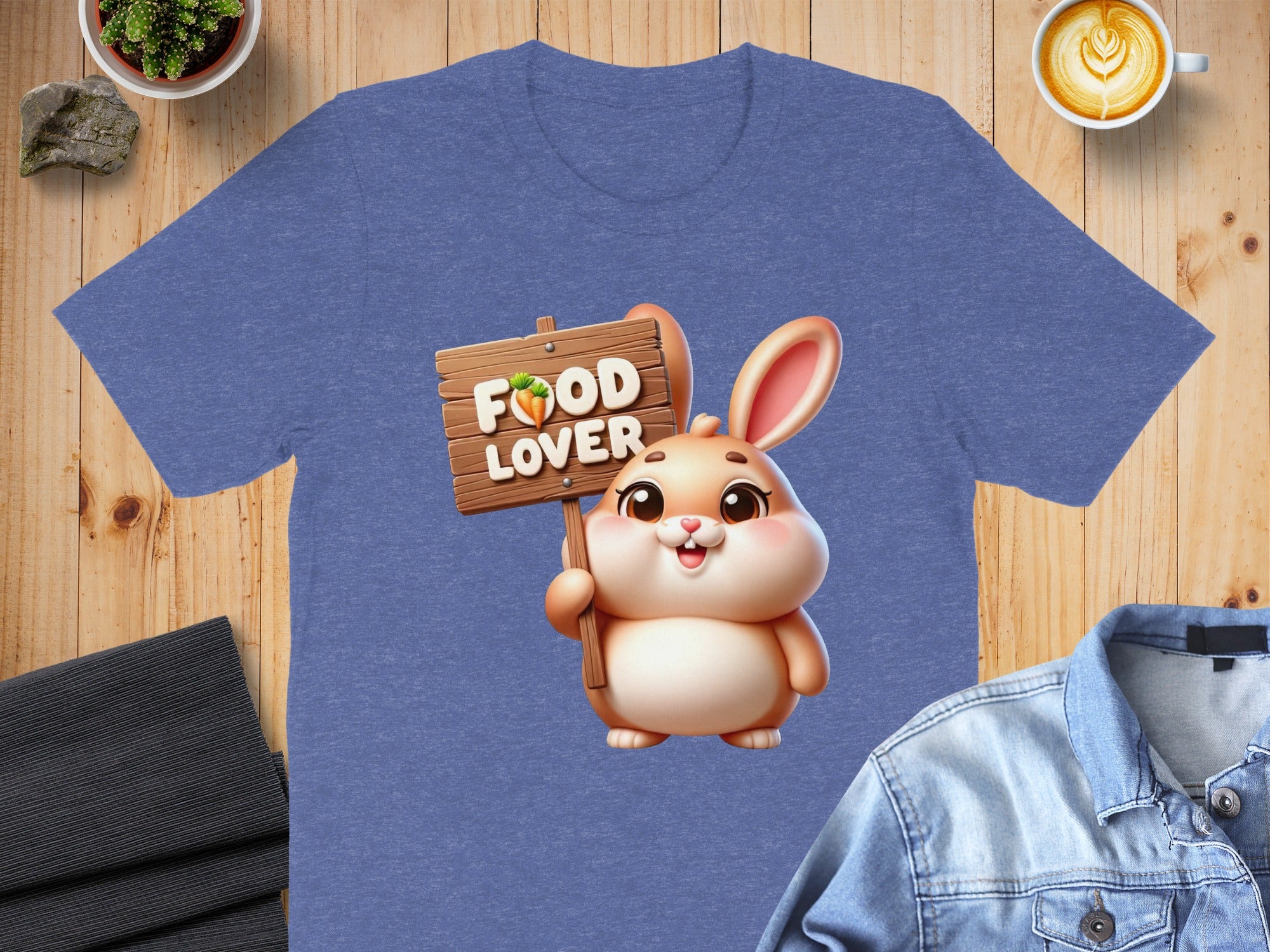 Blue t-shirt with cartoon rabbit holding "Food Lover" sign.