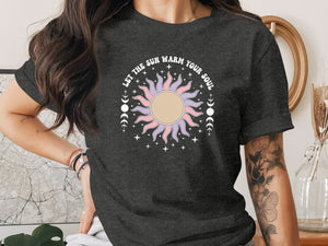 T-shirt with sun graphic and moon phases, "Let the Sun Warm Your Soul" text.