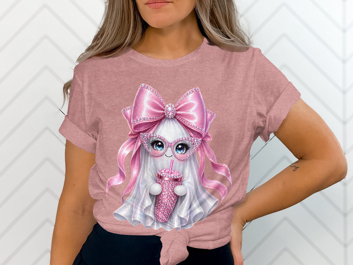 Pink t-shirt with a sparkly ghost wearing pink bow and glasses holding a drink.