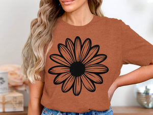 Terracotta t-shirt with black daisy graphic on the front.