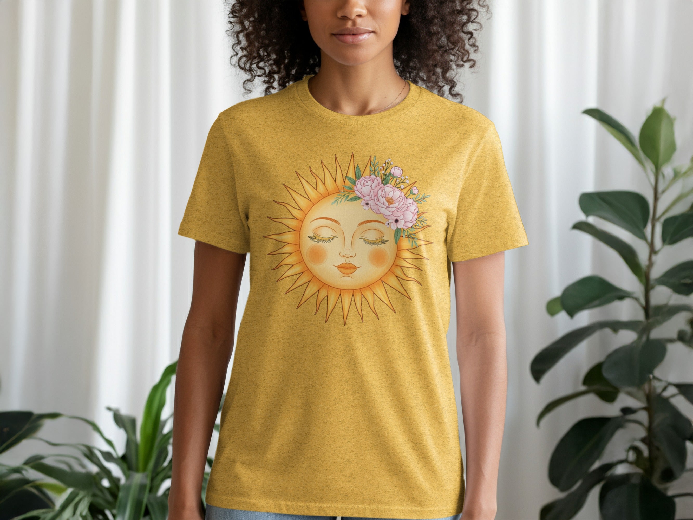 Yellow t-shirt with a sun graphic adorned with a floral crown.