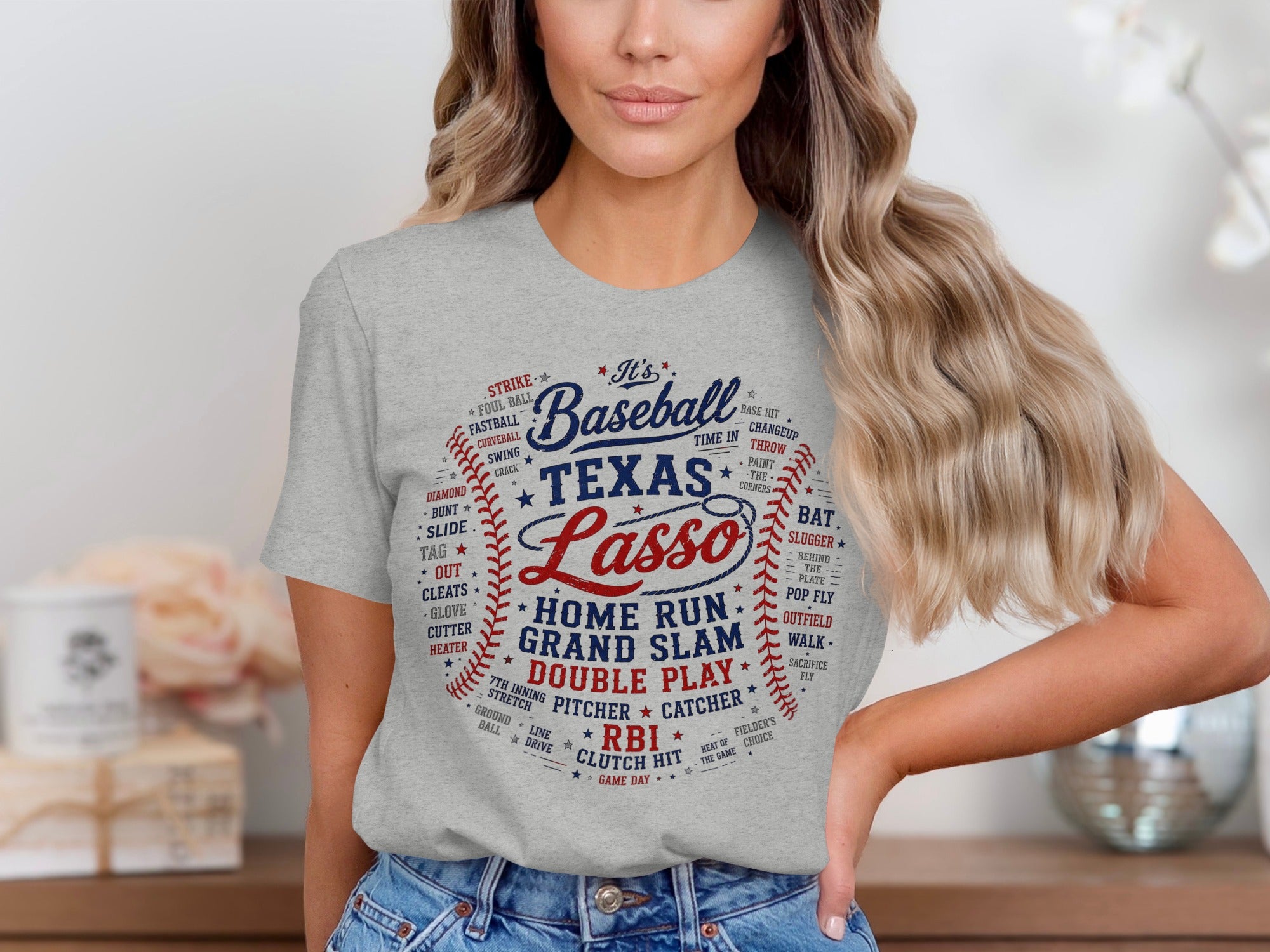 Gray t-shirt with "It's Baseball Texas Lasso" and baseball terms design.