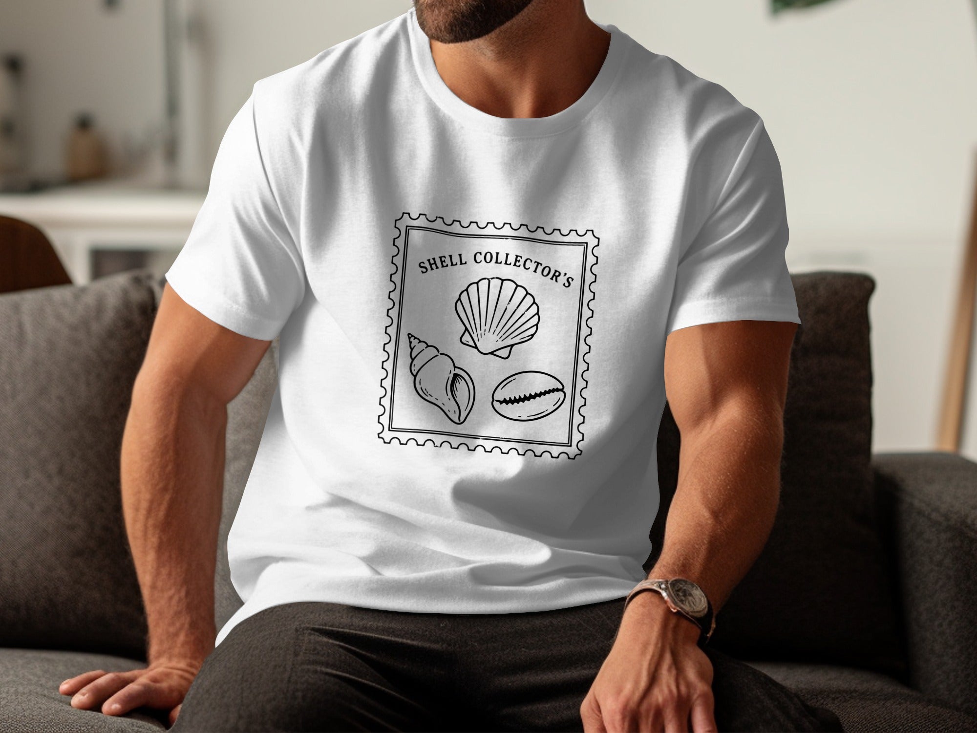 White t-shirt with a stamp graphic featuring shells and "Shell Collector's" text.