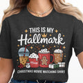 This is my Hallmark Christmas movie watching shirt with drinks and gifts.