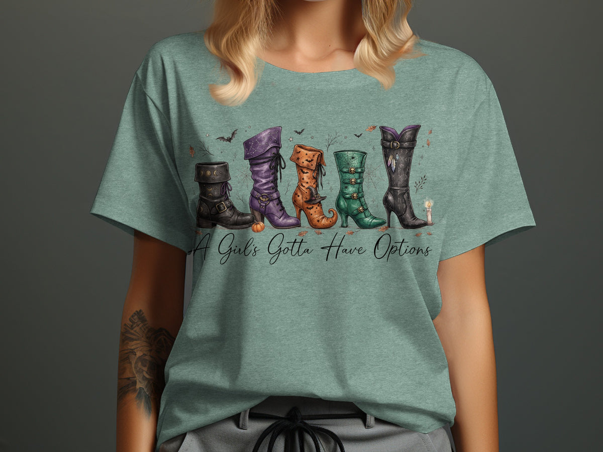 T-shirt with five Halloween-themed witch boots and "A Girl's Gotta Have Options" text.