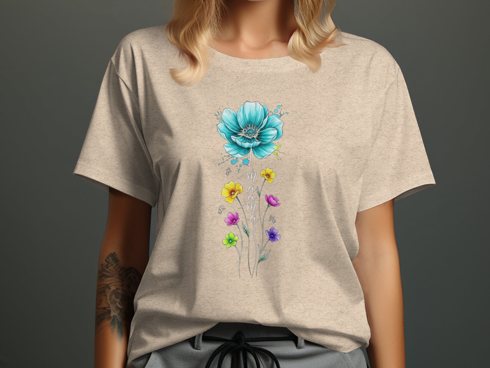 Cream t-shirt with blue flower and colorful wildflowers design.