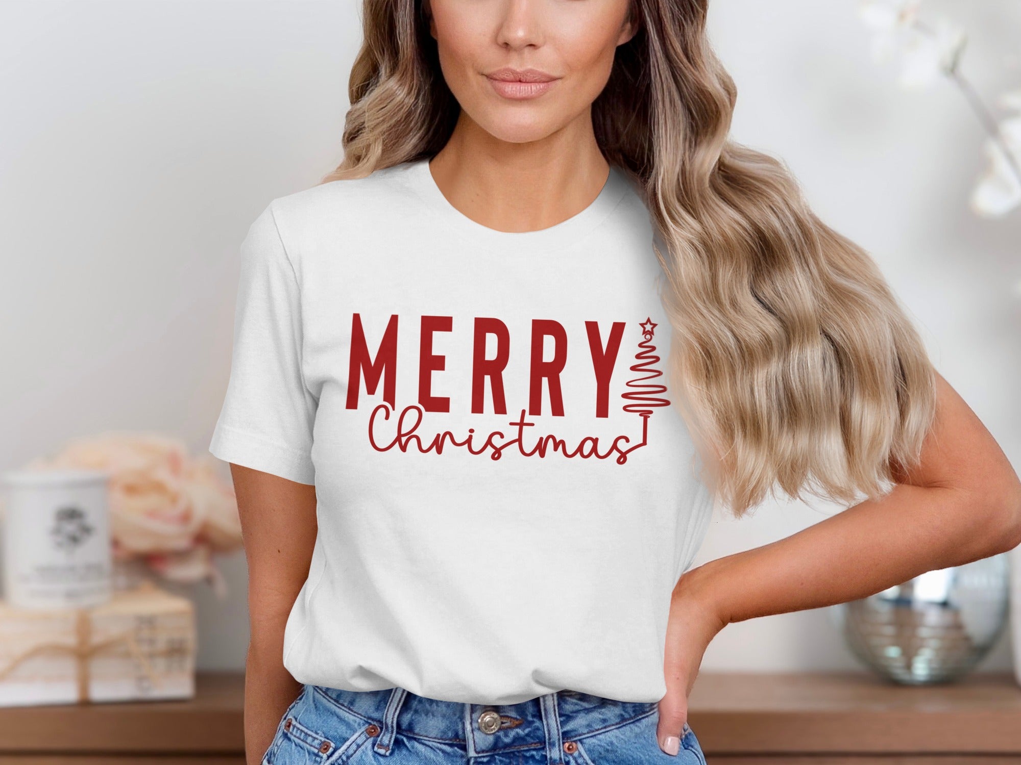 White t-shirt with red "Merry Christmas" text and a Christmas tree graphic.