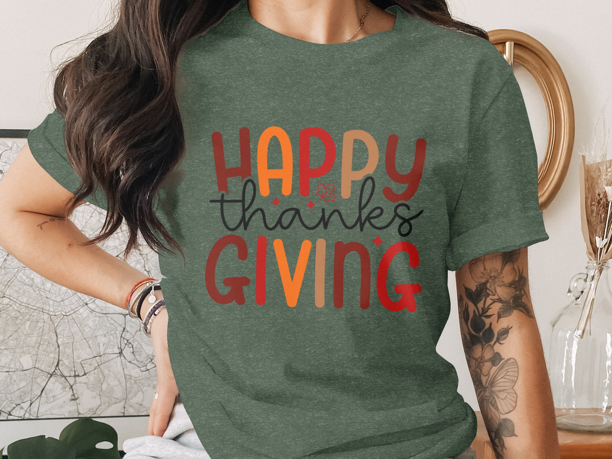 Green t-shirt with "Happy Thanksgiving" text in colorful letters.