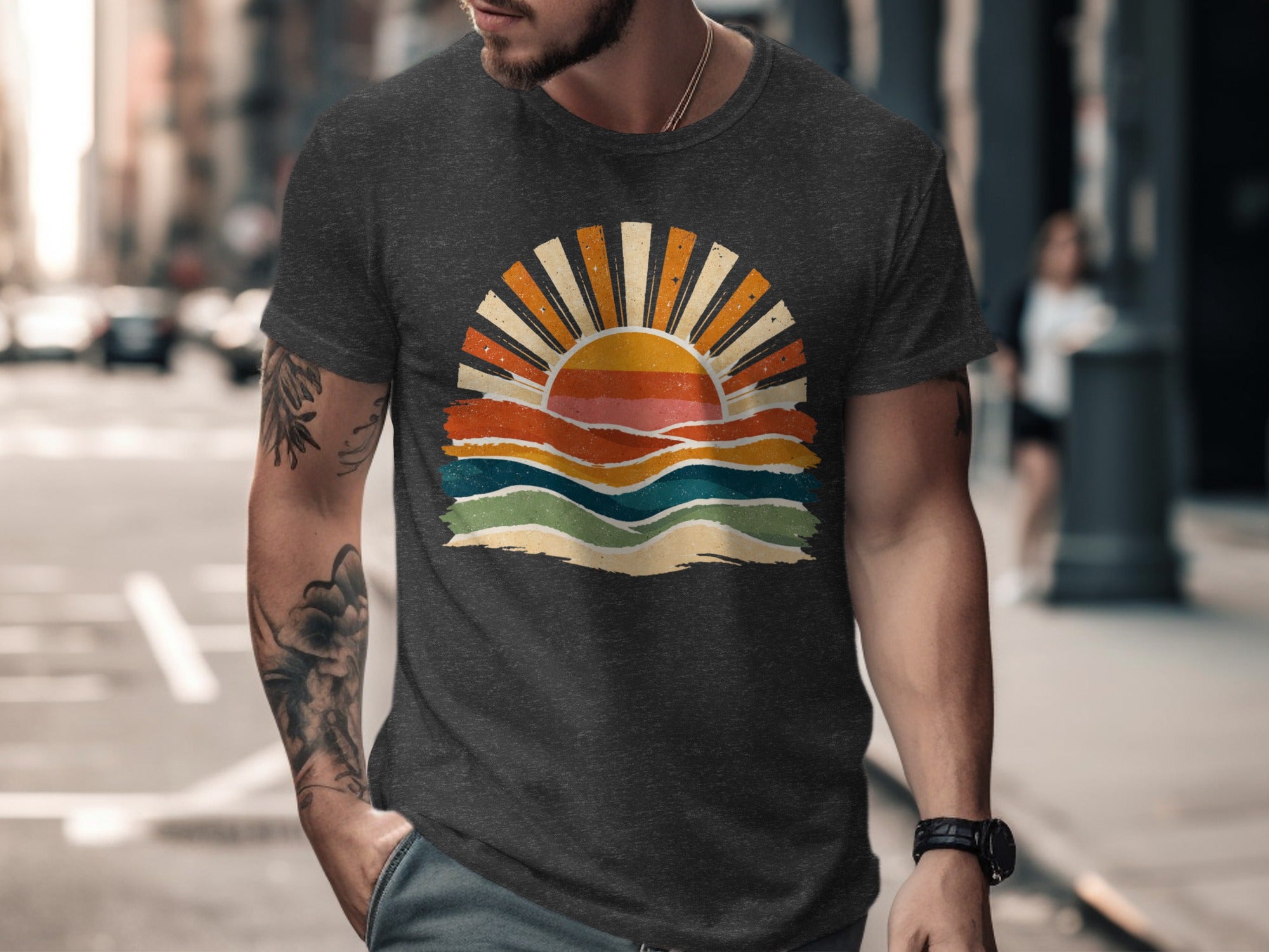 Dark grey t-shirt with retro sunset graphic featuring rays and colorful wavy lines.