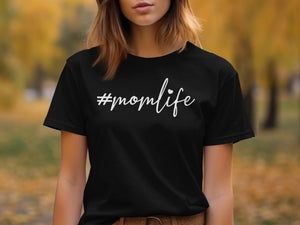 Black t-shirt with white "#momlife" text and heart graphic.