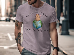 T-shirt with a capybara on Earth graphic and text "In a world full of drama... Be The Capybara".