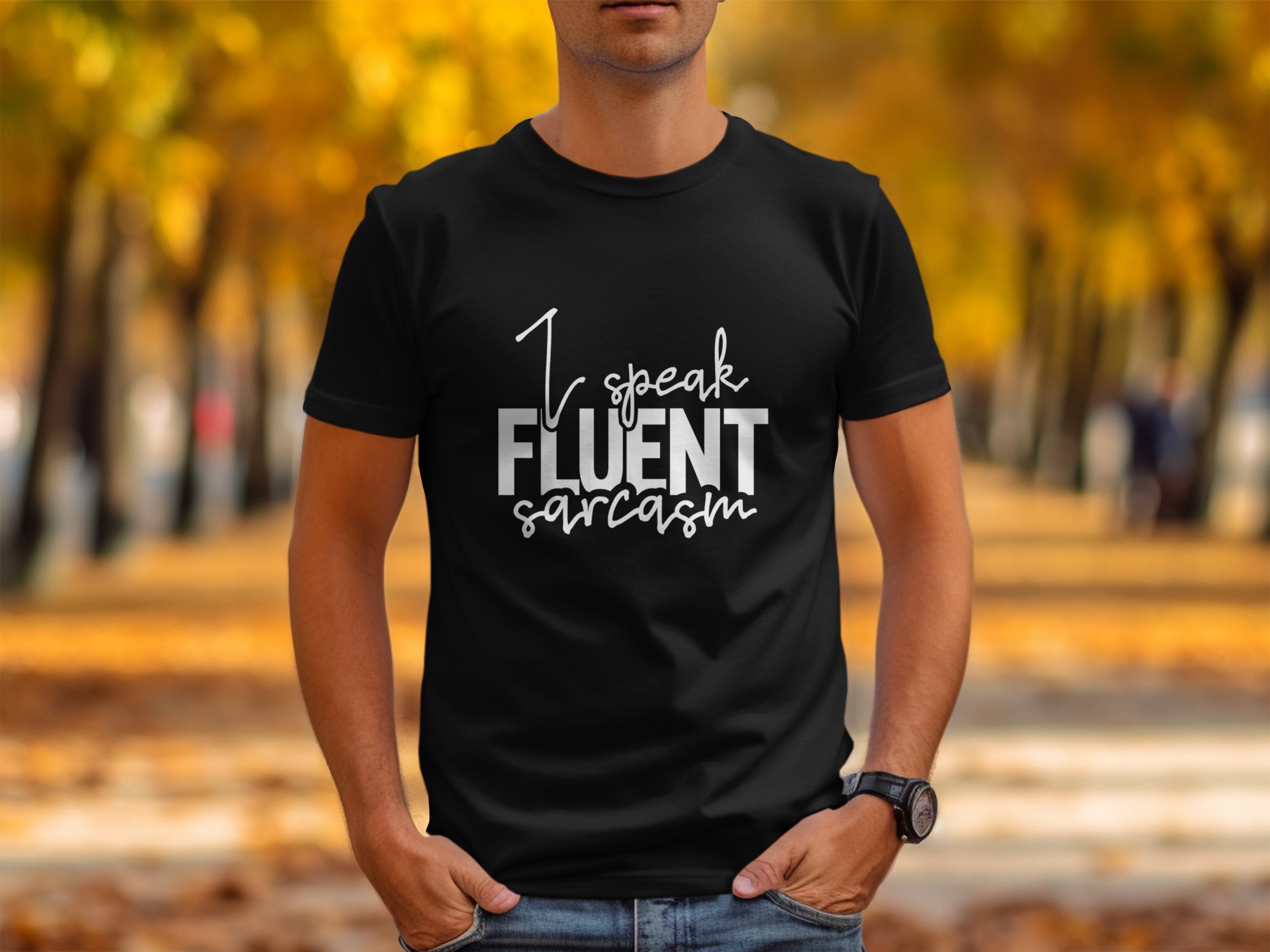 Black t-shirt with white text reading "I speak FLUENT sarcasm".