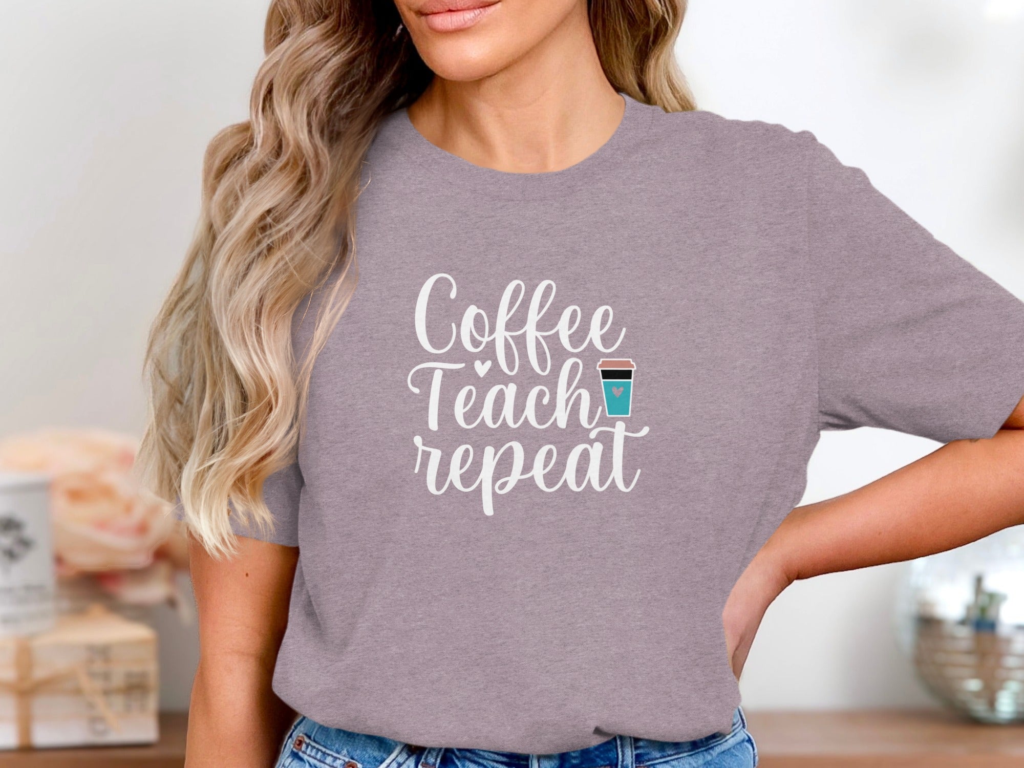 Gray t-shirt with "Coffee Teach repeat" text and coffee cup graphic.
