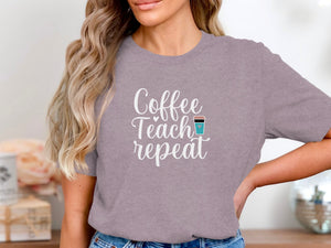 Gray t-shirt with "Coffee Teach repeat" text and coffee cup graphic.