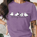 Purple t-shirt with line of ghost cats and text "spooky season".