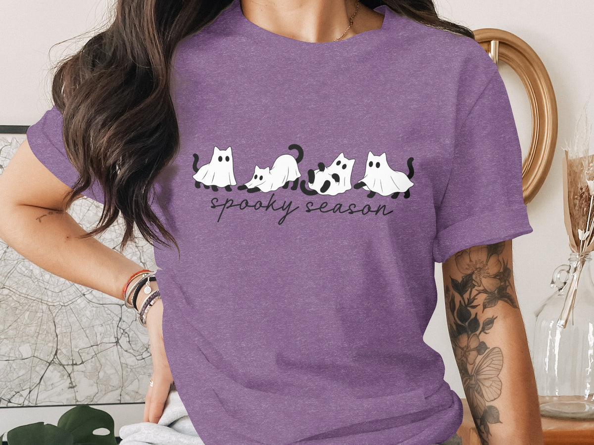 Purple t-shirt with line of ghost cats and text "spooky season".