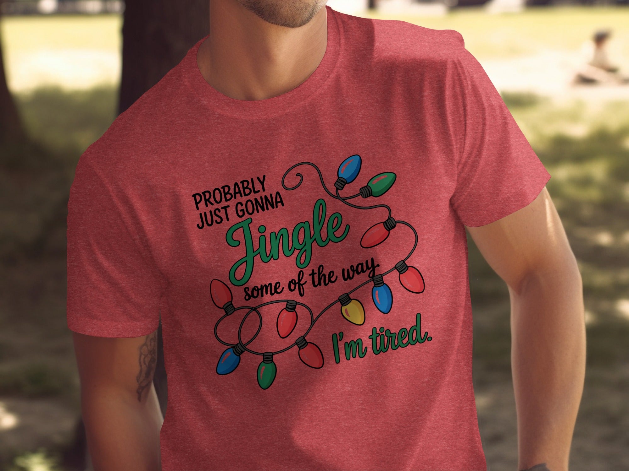 Red t-shirt with graphic text "Probably Just Gonna Jingle some of the way. I'm tired."