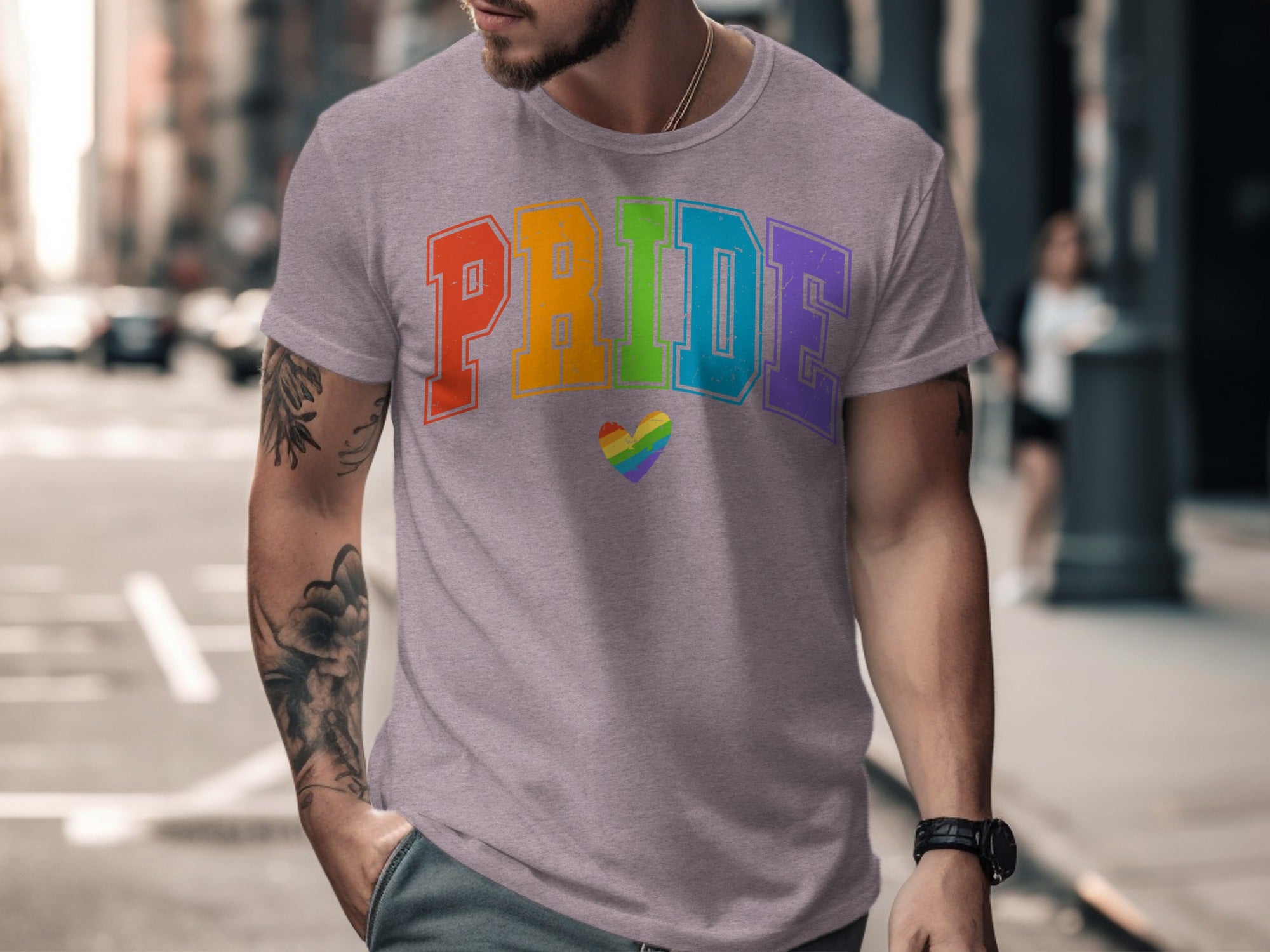 Purple t-shirt with rainbow "PRIDE" text and a rainbow heart.