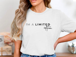 White t-shirt with black text "I'M A LIMITED edition."