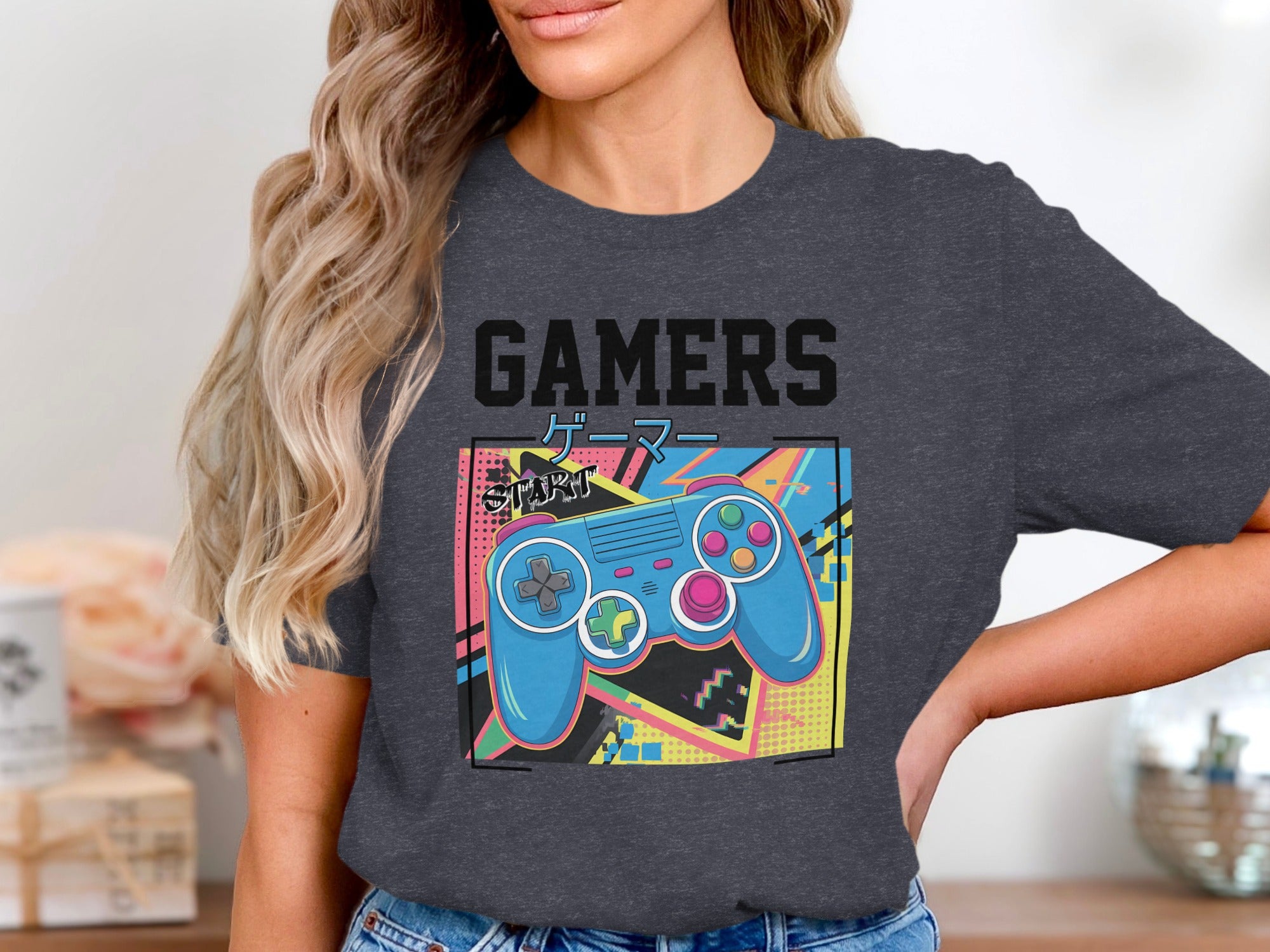 Gamers text above blue controller, Japanese text, and vibrant abstract geometric background.