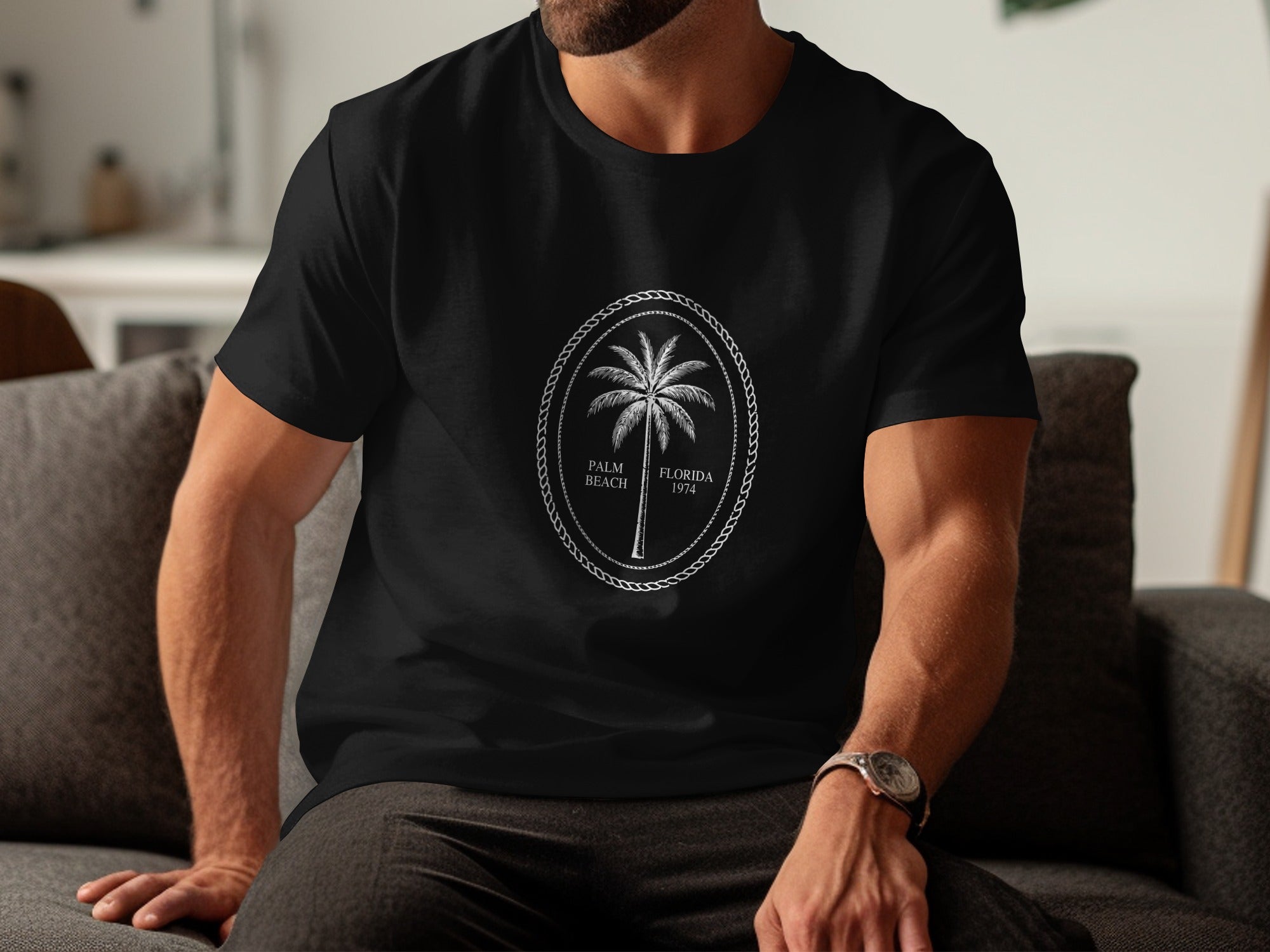 Black t-shirt with oval graphic featuring a palm tree, "Palm Beach," and "Florida 1974."