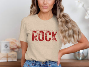 Beige t-shirt with distressed red text: "jingle bells jingle bells jingle bells ROCK"