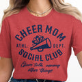 Red t-shirt with "Cheer Mom Social Club" text and megaphone graphic.