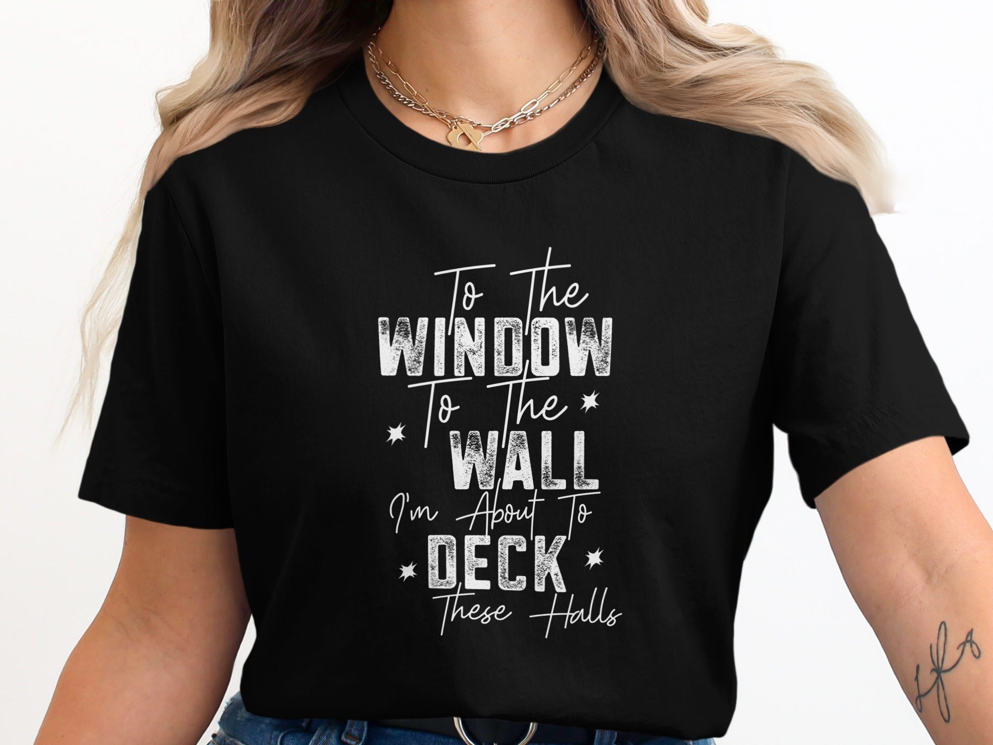 Black t-shirt with text "To The Window To The Wall I'm About To Deck These Halls".