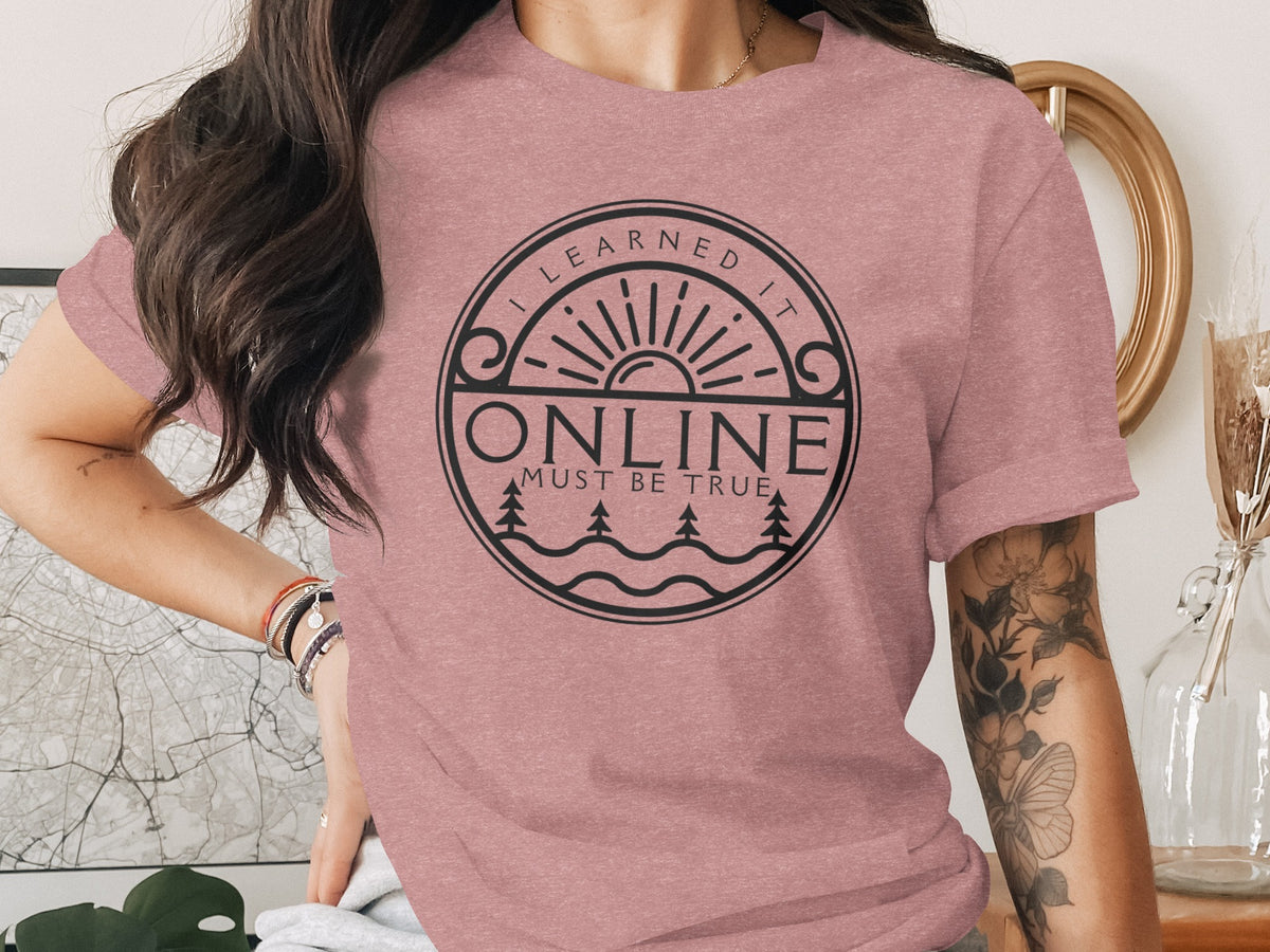 Pink t-shirt with circular graphic reading "I LEARNED IT ONLINE MUST BE TRUE."