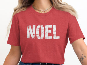 Red t-shirt with distressed white "NOEL" graphic and gold necklace.