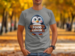Gray t-shirt with a cartoon penguin holding a "FOOD LOVER" sign.