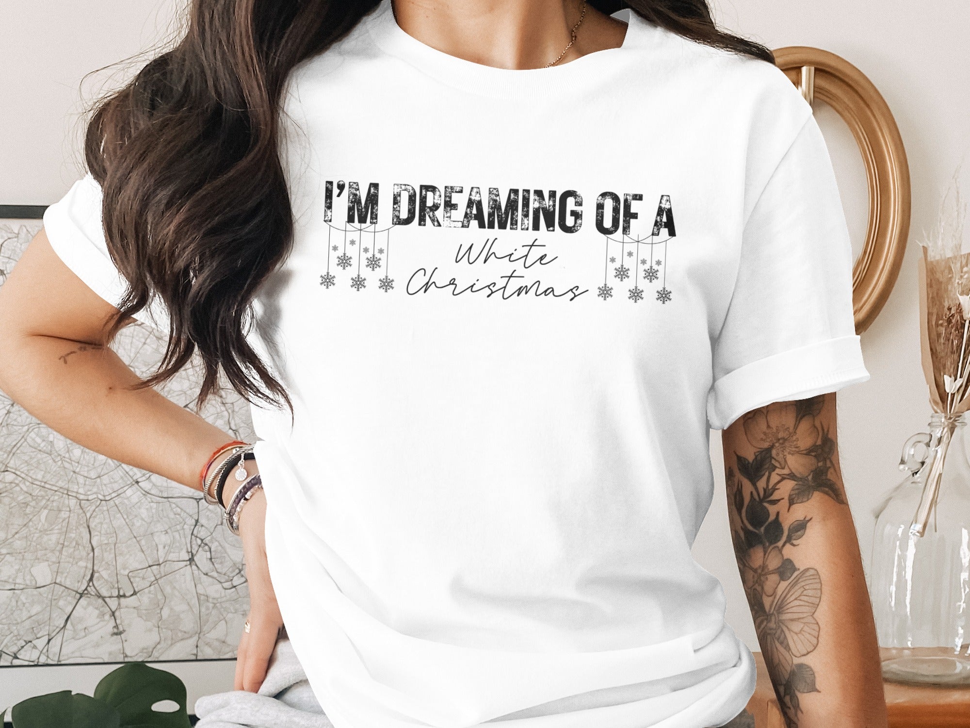 White t-shirt with "I'M DREAMING OF A White Christmas" text and snowflakes.