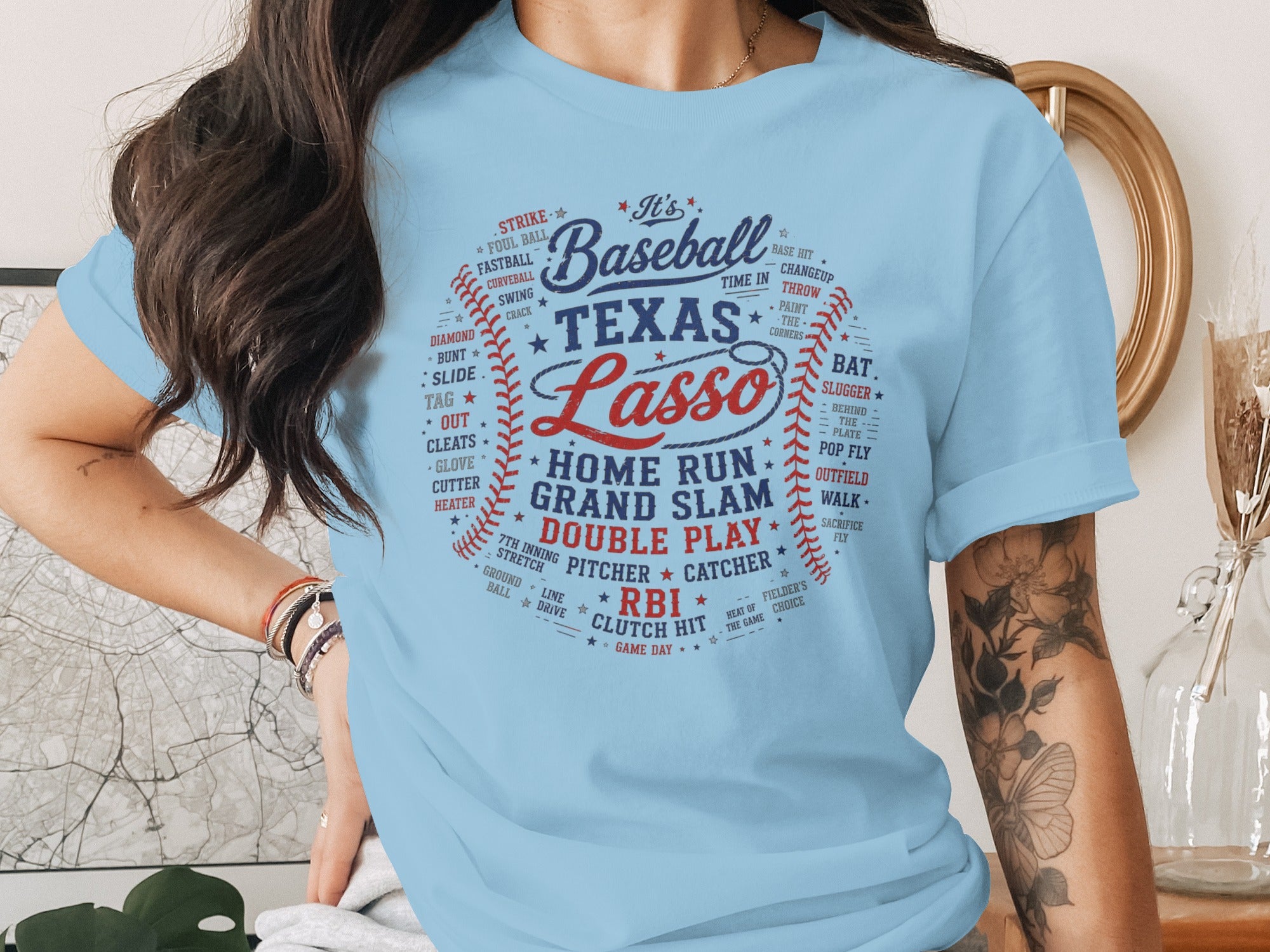 Light blue t-shirt with Texas Lasso baseball design featuring baseball terms.