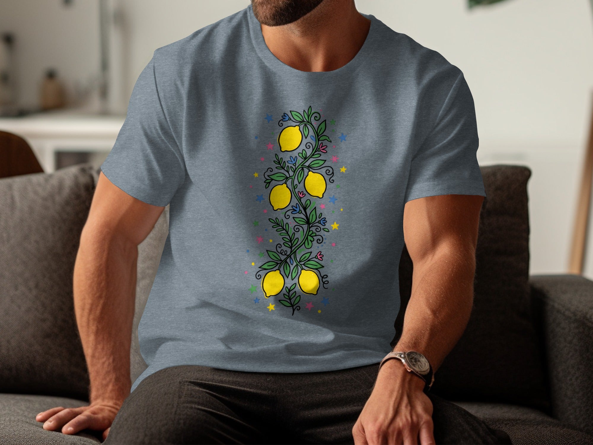 Gray t-shirt with a vertical lemon branch and colorful stars design.