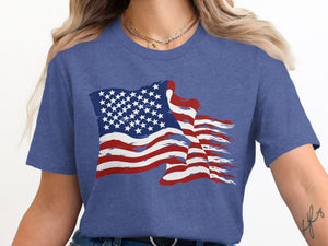 Distressed American flag graphic printed on a heather blue t-shirt.