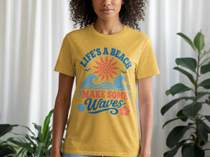 Yellow t-shirt with "Life's a Beach Make Some Waves" text, sun, waves, and flowers.