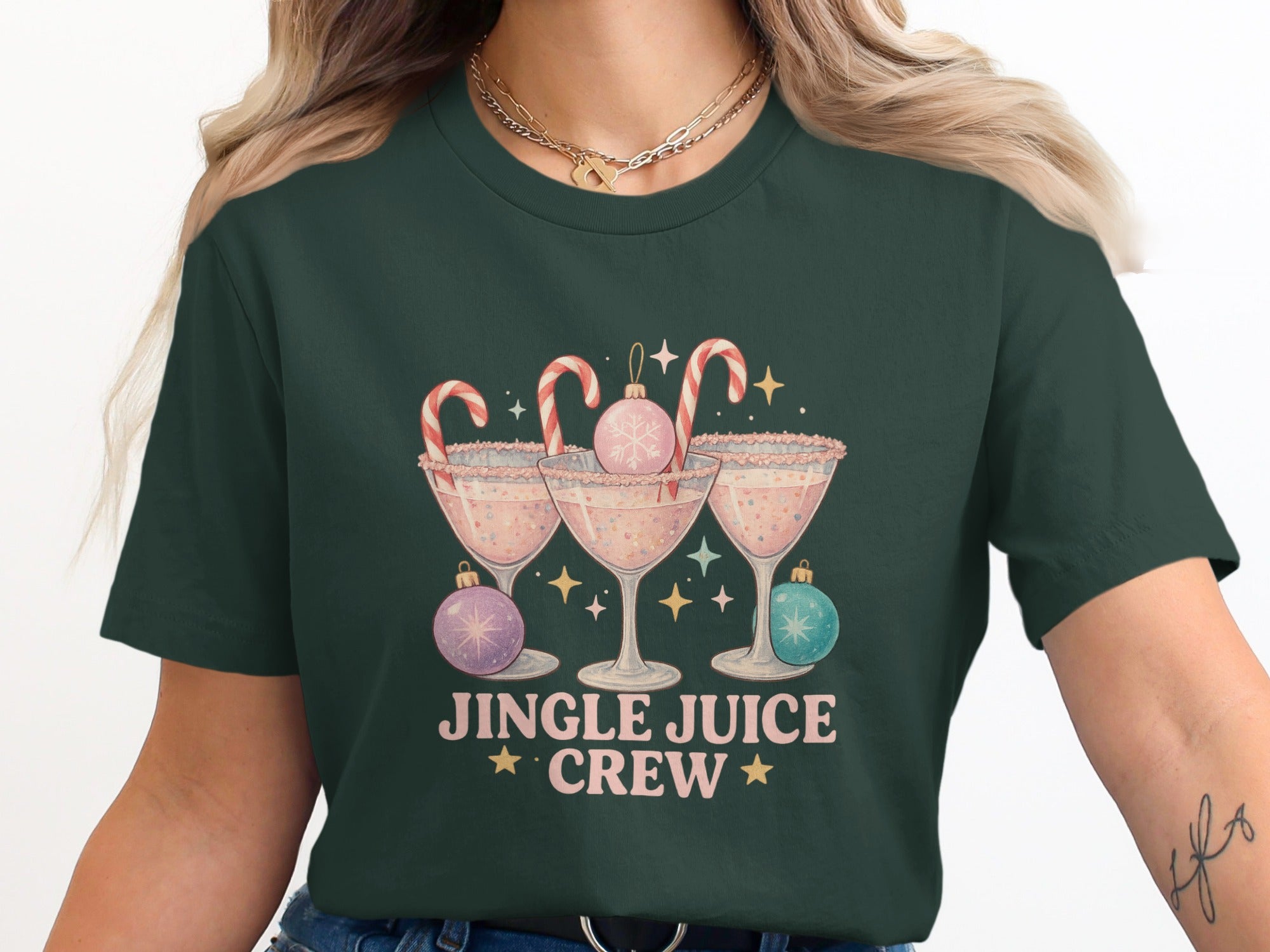 Green t-shirt with "JINGLE JUICE CREW" text and holiday drinks graphic.