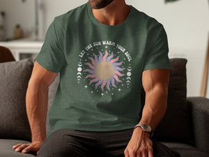 Dark green t-shirt with sun graphic and text "LET THE SUN WARM YOUR SOUL"