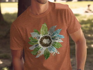 Orange t-shirt with a sunflower graphic featuring distressed brick patterns.