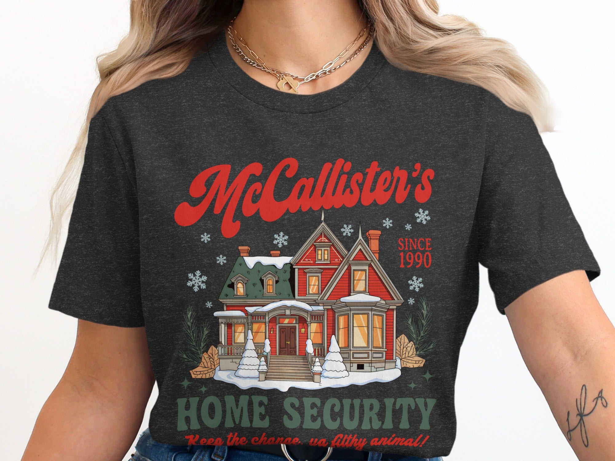 McCallister's Home Security since 1990 with a snow-covered house and holiday details.