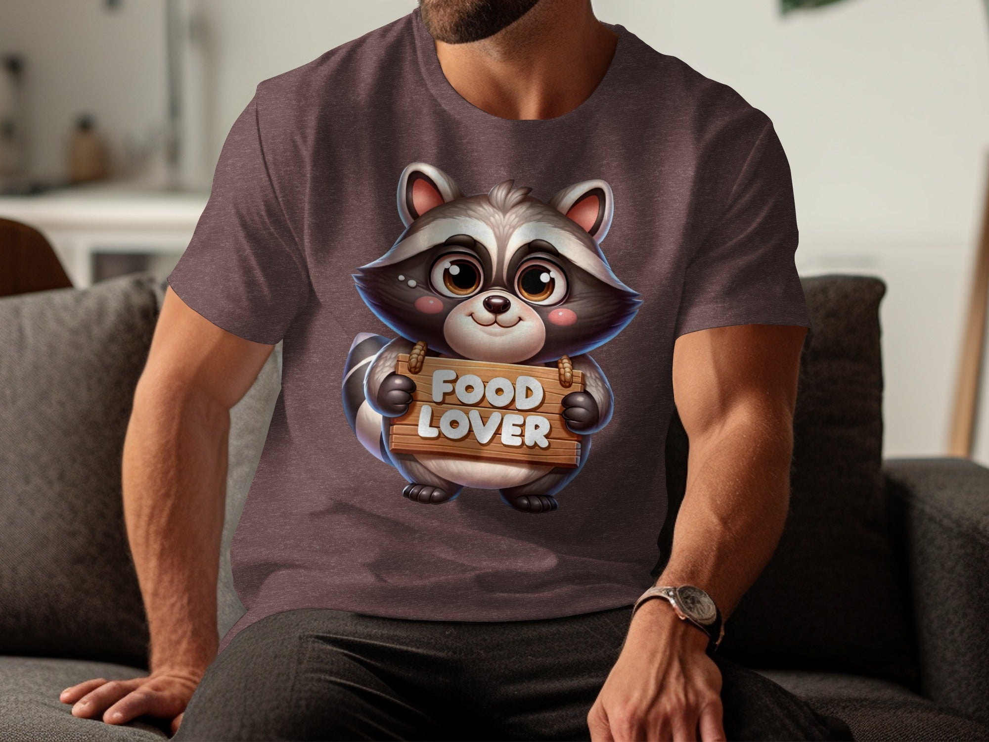 Cartoon raccoon holding wooden sign reading "FOOD LOVER" on t-shirt.