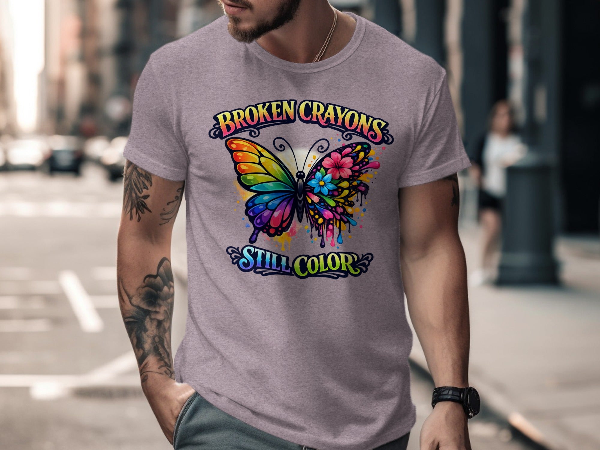 T-shirt with "BROKEN CRAYONS STILL COLOR" text and a colorful butterfly design.